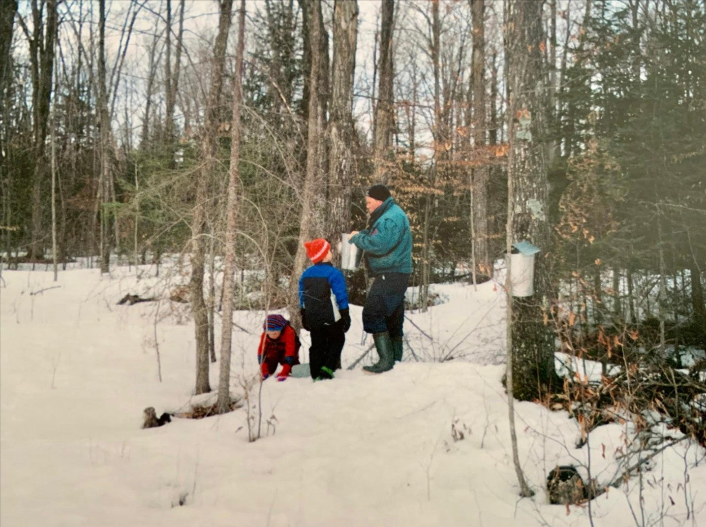 Noah and Nathan learning the family tradition from their Dad.